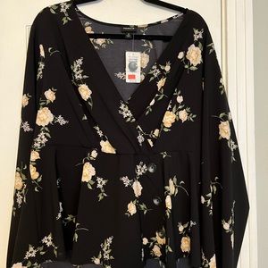 Perfect for the office or a night out! Floral blouse